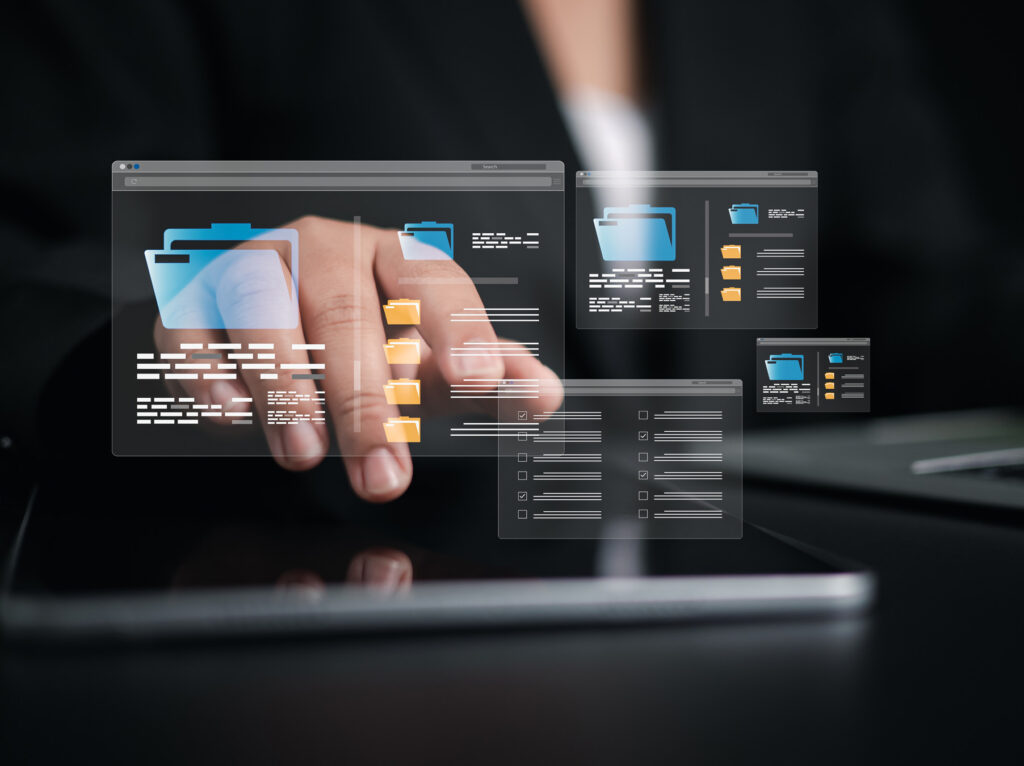 Document Management System (DMS) being setup by IT consultant working on laptop computer in office, Businesswoman using computer to document management, Workflow sharing, Backup online document files