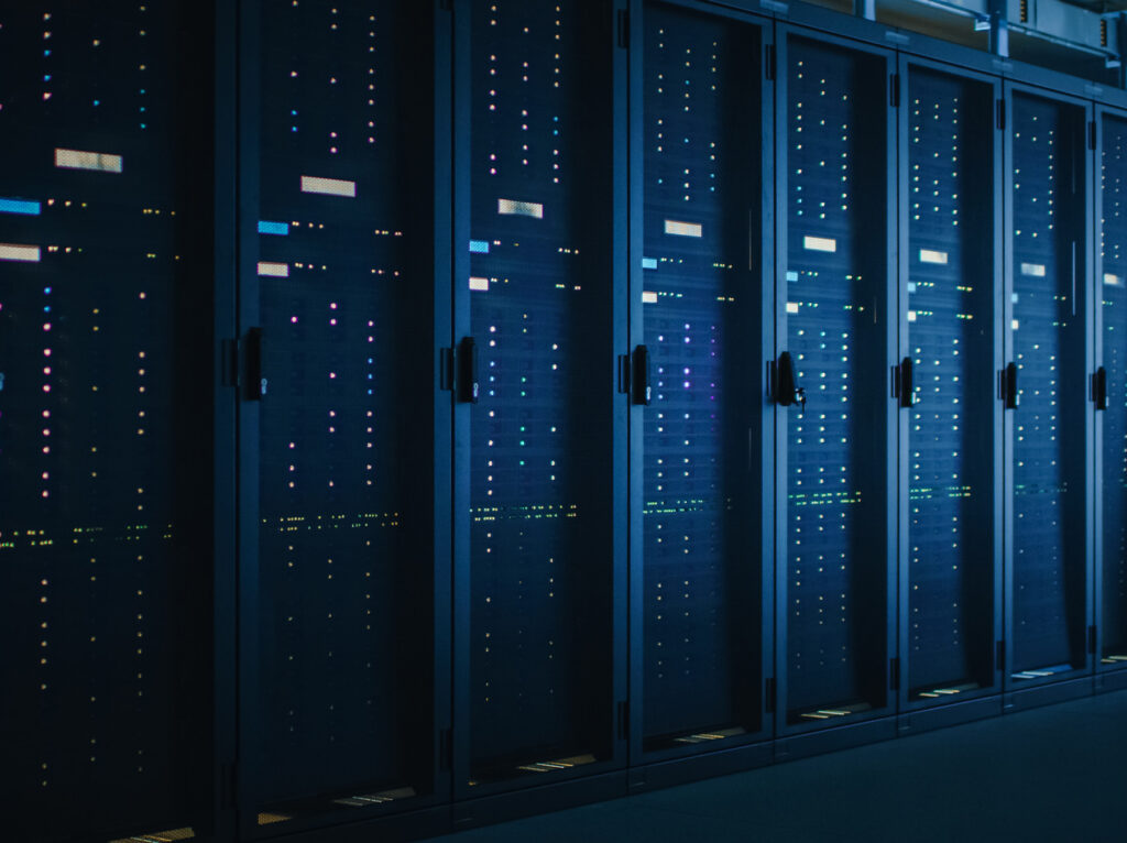 Shot of Dark Data Center With Multiple Rows of Fully Operational Server Racks. Modern Telecommunications, Cloud Computing, Artificial Intelligence, Database, Supercomputer.